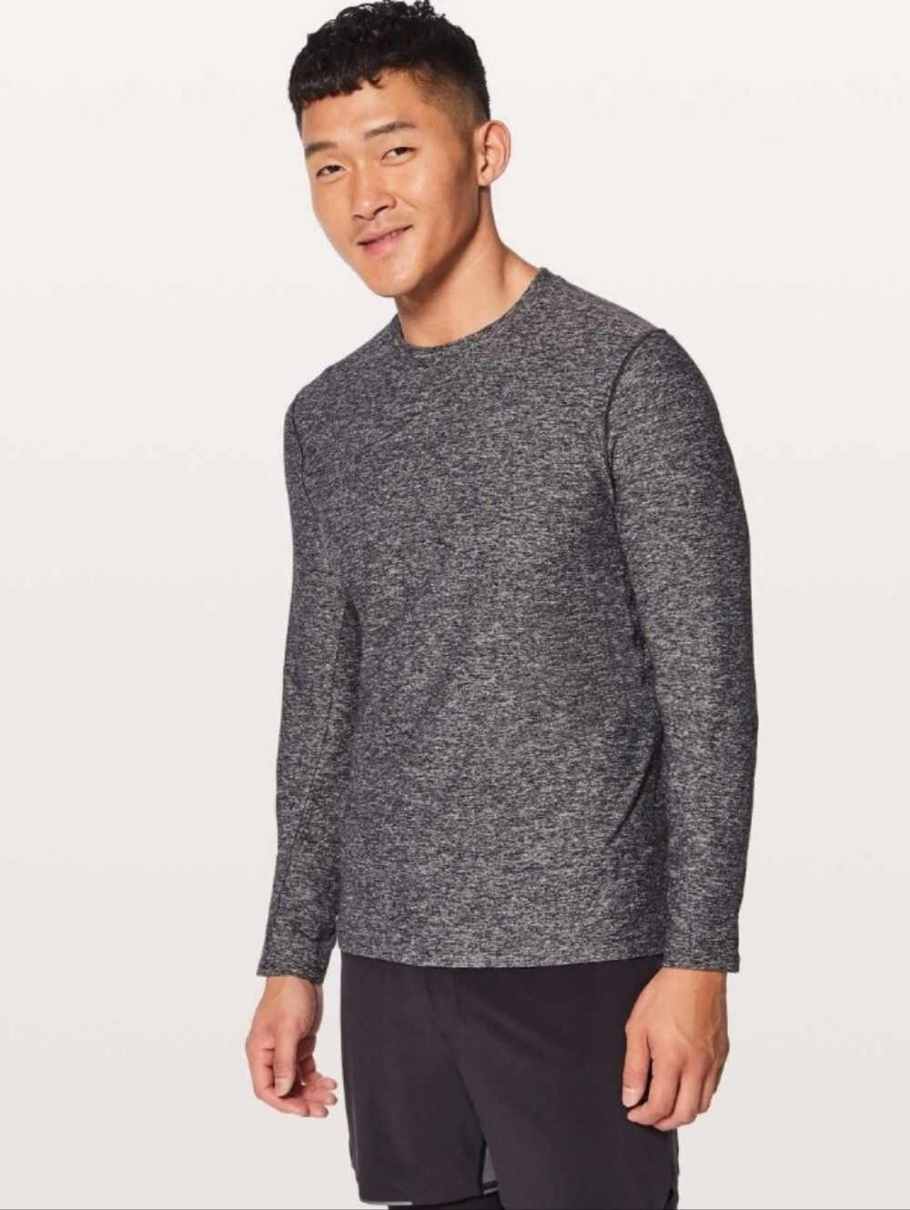 Lululemon Surge Warm Long Sleeve In Heathered Black Size Medium